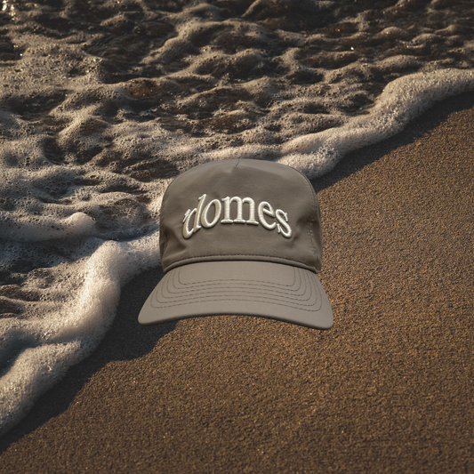 'domes muted sand cap.